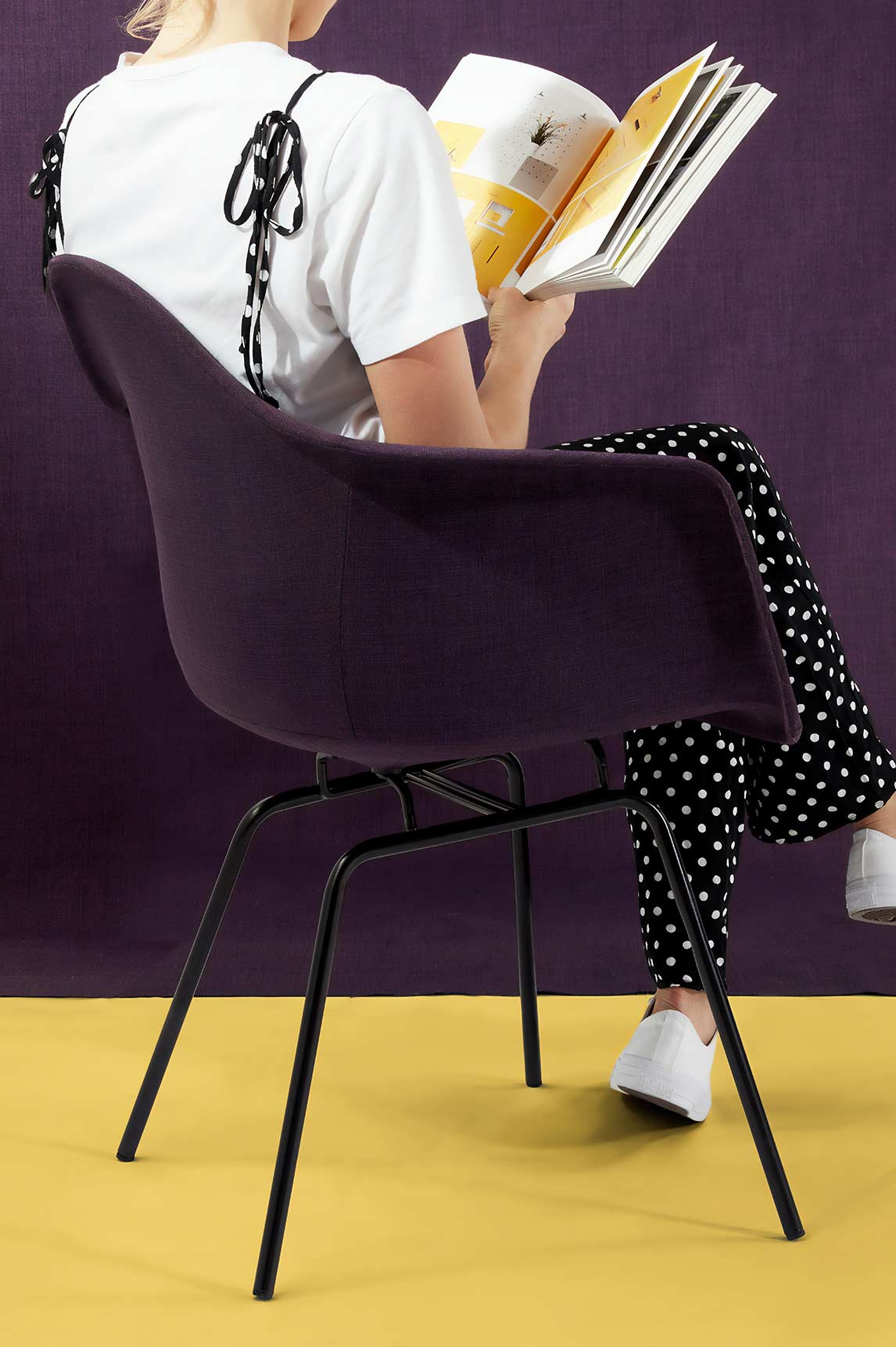 Woman Sitting on a Chair Reading